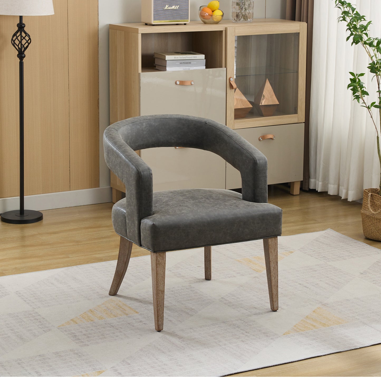 Rovayne Chair – Stonehide PU, Openbarrel Frame, Weathwood Legs