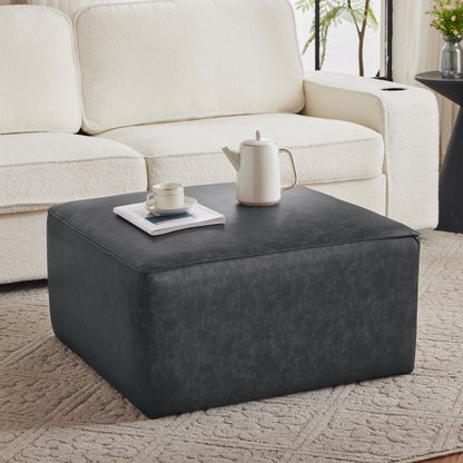 Tanfiel Ottoman – Noirhide Surface, CubeNest Form