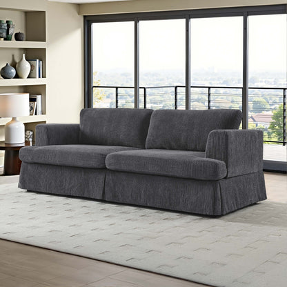 Skirted Luxe Sofa – Charcoal Grey Corduroy Lounge with Tailored Hem