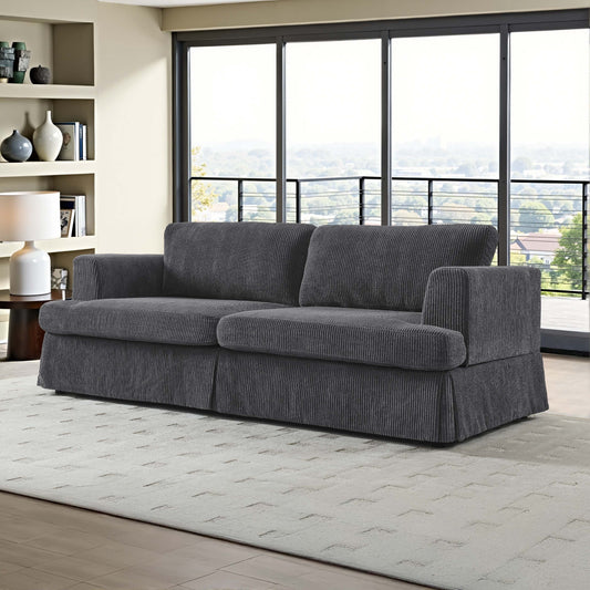 Skirted Luxe Sofa – Charcoal Grey Corduroy Lounge with Tailored Hem